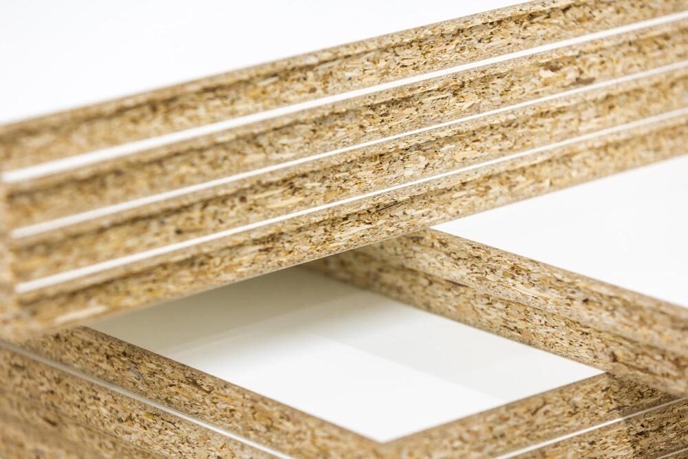 Three-layered Particle Board