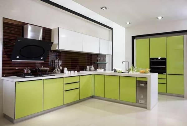 https://cloudfrontgharpediabucket.gharpedia.com/uploads/2018/02/L-Shaped-Modular-Kitchen-in-Green-Colour-with-Upper-Cabinets-Recessed-Lighting-Glossy-Wooden-Kitchen-Backsplash-18-0503070001.jpg