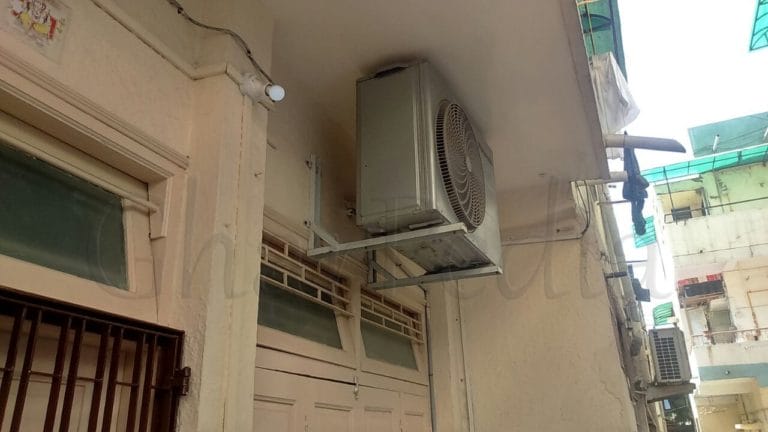 Fixing an outdoor AC unit with a bracket
