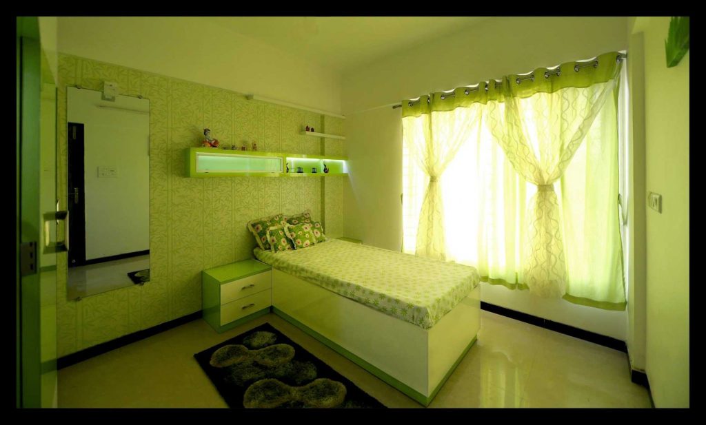 Bedroom-accommodates-a-Single-Wooden-Bed-with-one-Side-Table-Shaggy-Rug-Dressing-Mirror-Open-Box-Shelves-on-Bed-Backwall for Decor Items Curtains over a Window