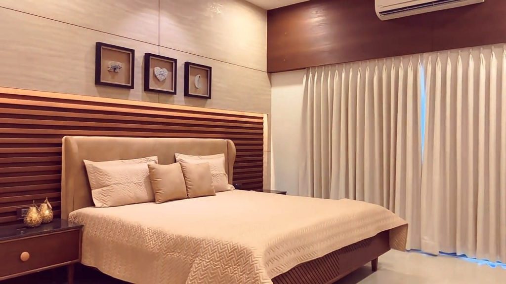 This Bedroom consists Combination of Beige Brown Colours.