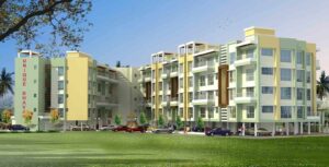 Birds Eye View of Low Rise Apartment Blocks with Parking Area on Ground Floor & Trees on the Periphery of the Premise incl. Children Pay Area