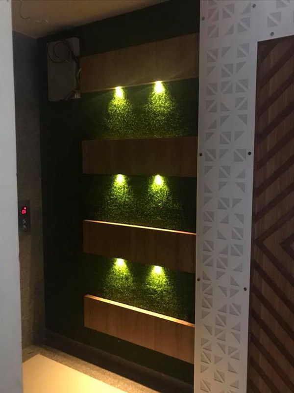 Down Lighting Idea at Texture & Wooden Panel Wall