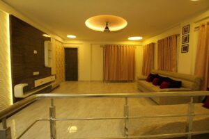 Family Sitting Area besides Staircase on First Floor accommodating Sofa