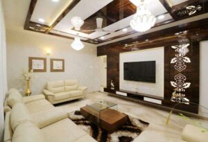 Living Room incorporating Of-White Leather Upholstered Sofa Set, Glass Center Table with Wooden Shelf below