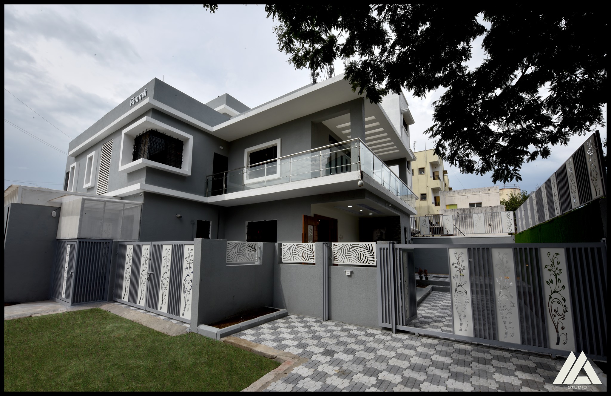 Grey in body and white in boarder modern exteriors