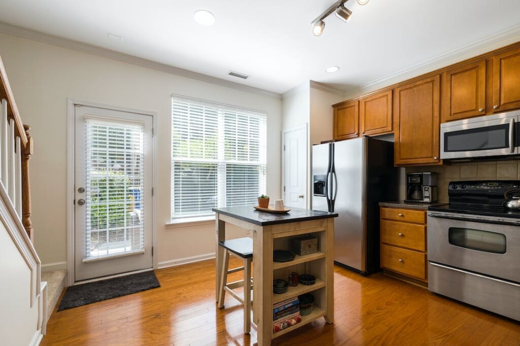 Modern touch in Kitchen with maple wood cabinbets