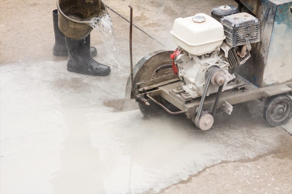 Wet Saw To Cut The Concrete Slab