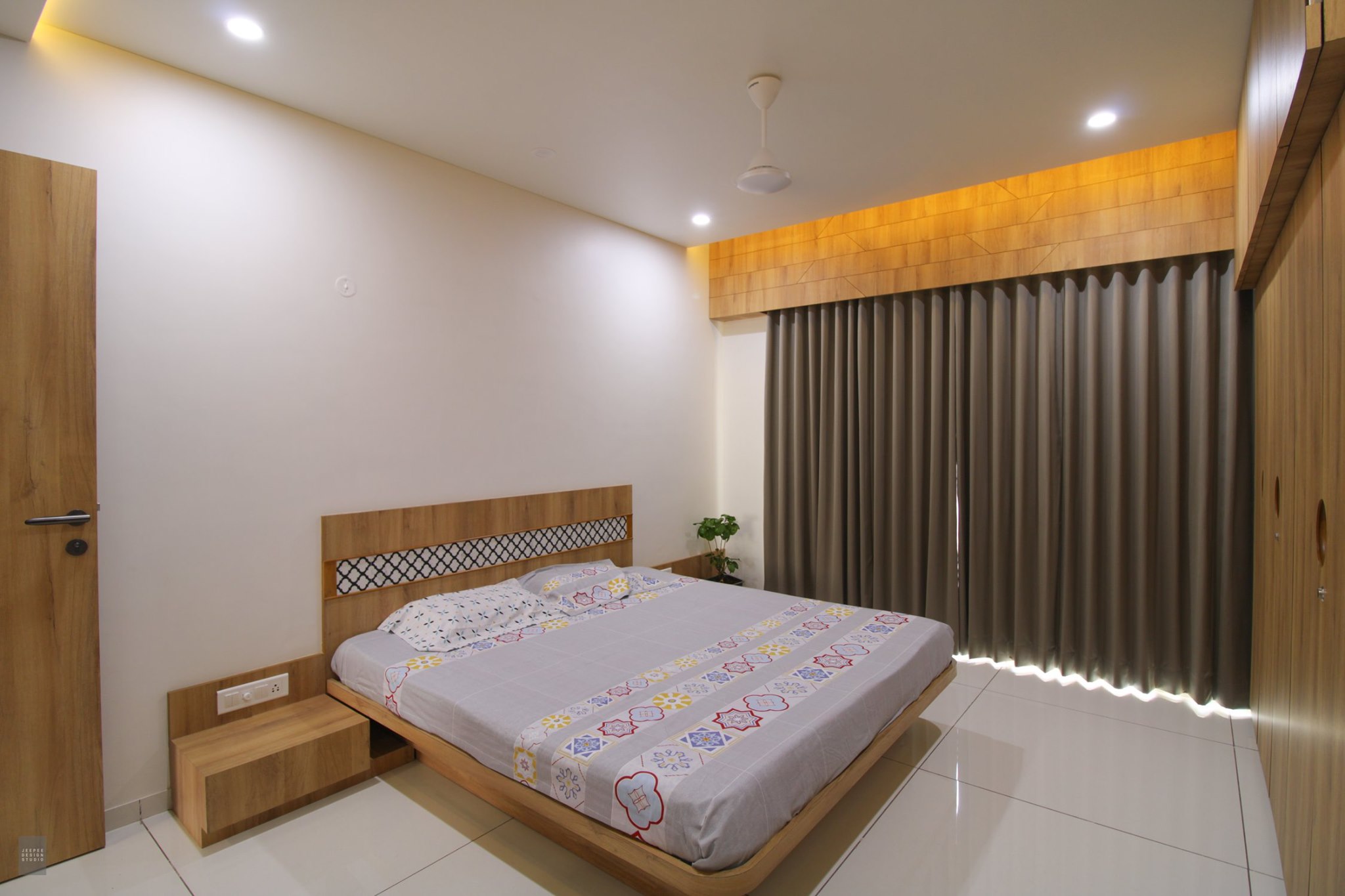 Minimalistic bedroom In shades of white, grey and hints of wood