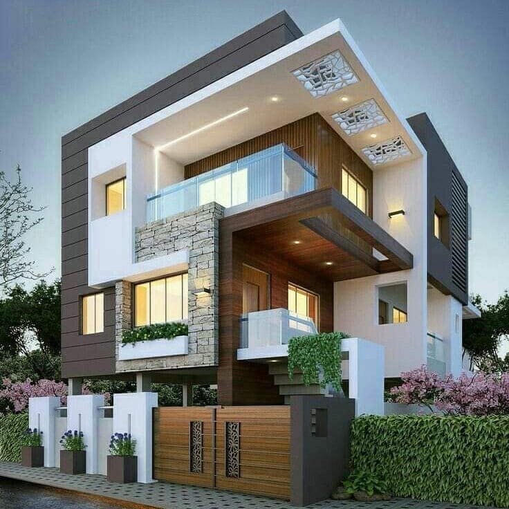 Multi-layered ground plus two stories structure with a white frame standing out