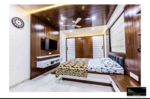 A modern minimalistic bedroom in white and darker shade of wood