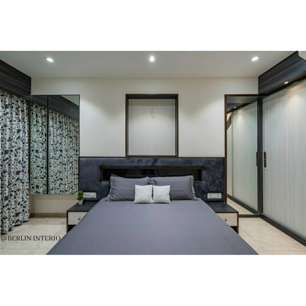 A modern compact bedroom in greys and white - 1