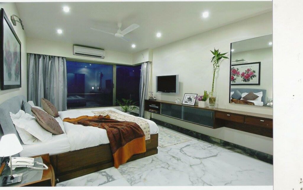 Bedroom consists of Rectangular Wooden Bed