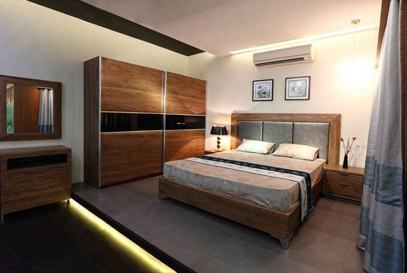 Modern Bedroom with a Wooden Rectangular Bed with Grey Cushioned Backrest & Wooden Frame