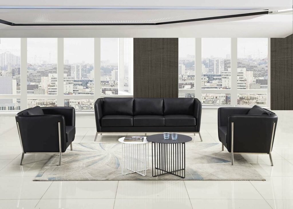 The 3 Seater Black Leather Upholstered Sofa & 2 -Single Seater Sofa Chairs with S.S. Framed Legs is Making great Contrast with White Colour