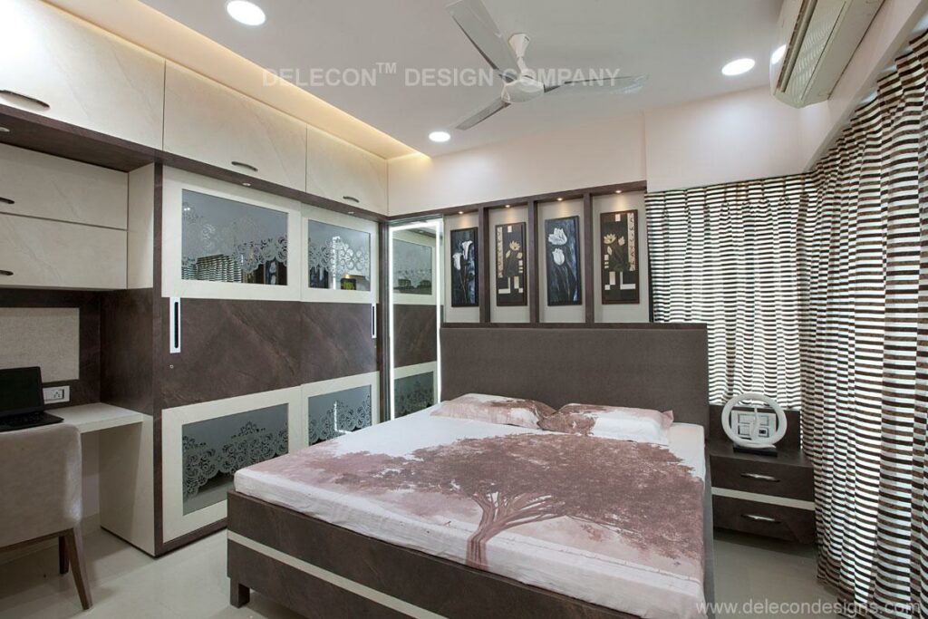 The Bedroom Consists Rectangular Brown Bed with Brown Cushioned Backrest