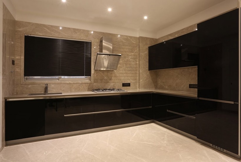 The Black & Beige Kitchen Consists L Shape Counter Top