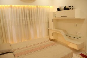The White Bedroom Consists White Rectangular Bed with Cotton Bedsheet