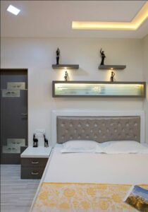 This Bedroom has a Rectangular Wooden Bed - 1