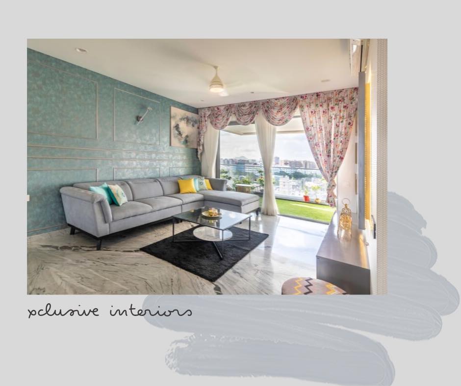 Grey Upholstered Sectional Sofa Nicely Placed in this Living Room with Square Metal Framed Center Table & Glass Top