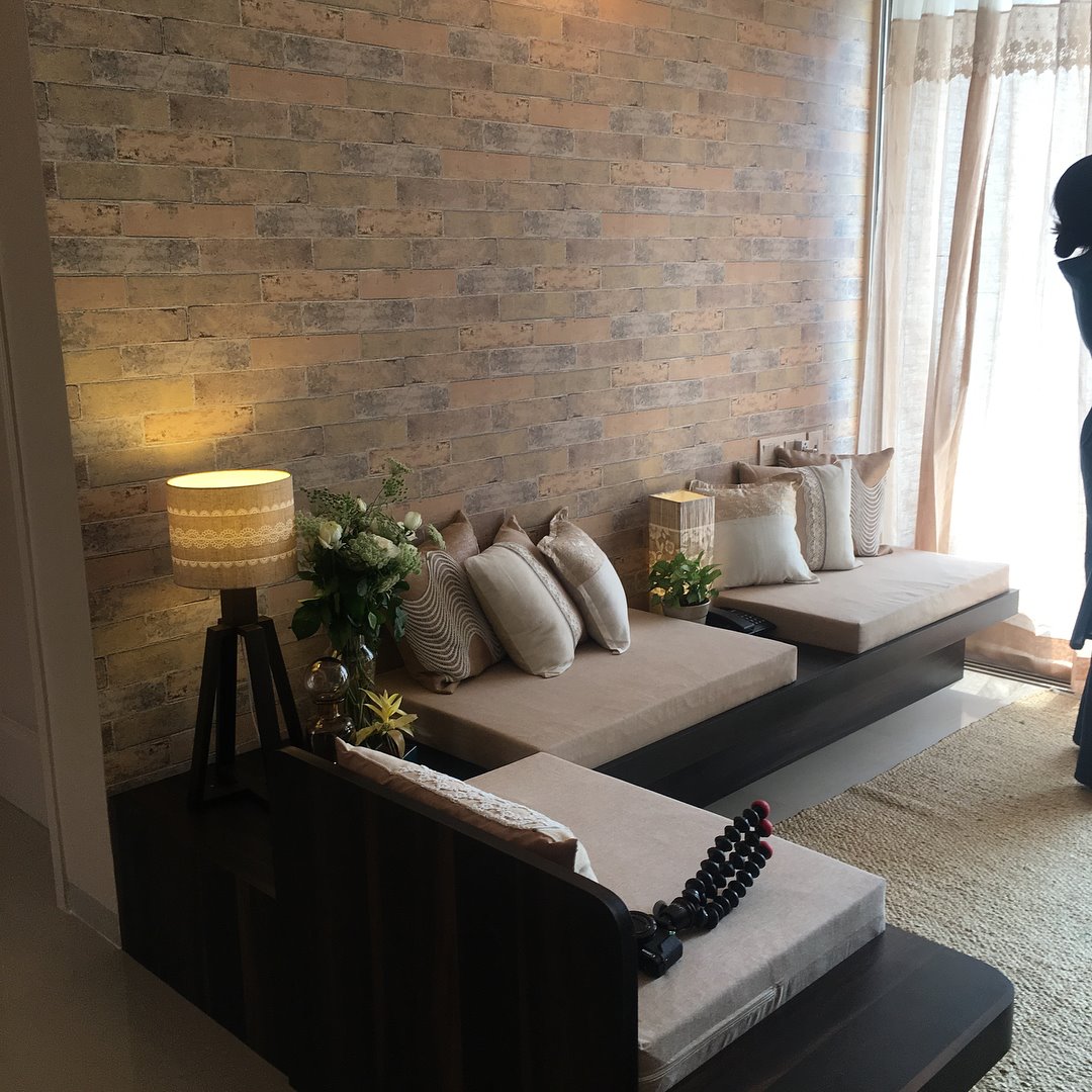 The L-Shape 6 Seater Wooden Sofa having Module of Two Beige Upholstered Seats