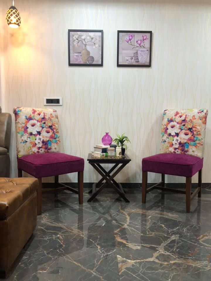 The Purple Upholstered Armless Chairs with Beautiful Floral Printed Backrest is Nicely Placed in this ME TIME Corner.