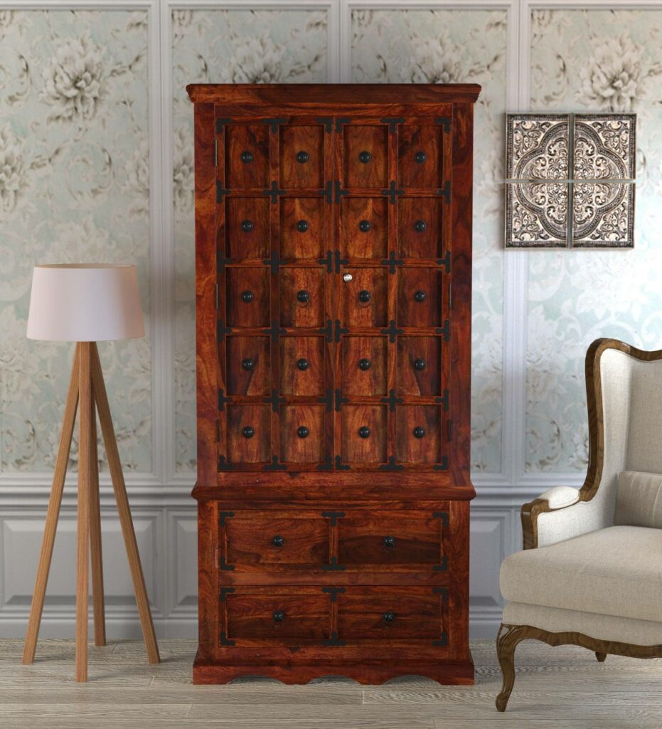 The Wooden Vintage Styled Wardrobe has Metal Knob Handles & Frames Decorated with Metal Elements