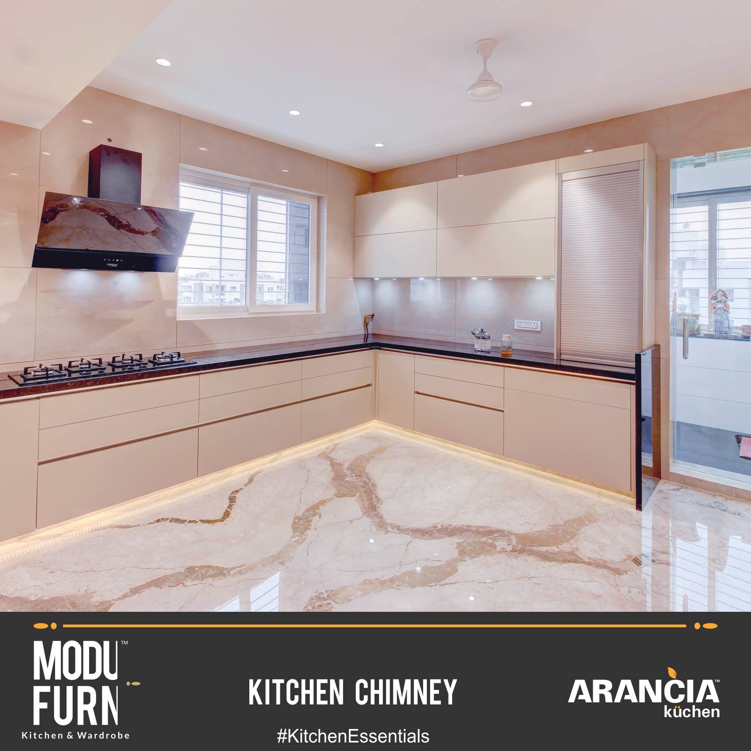Peach Coloured Kitchen with L Shape Black Countertop