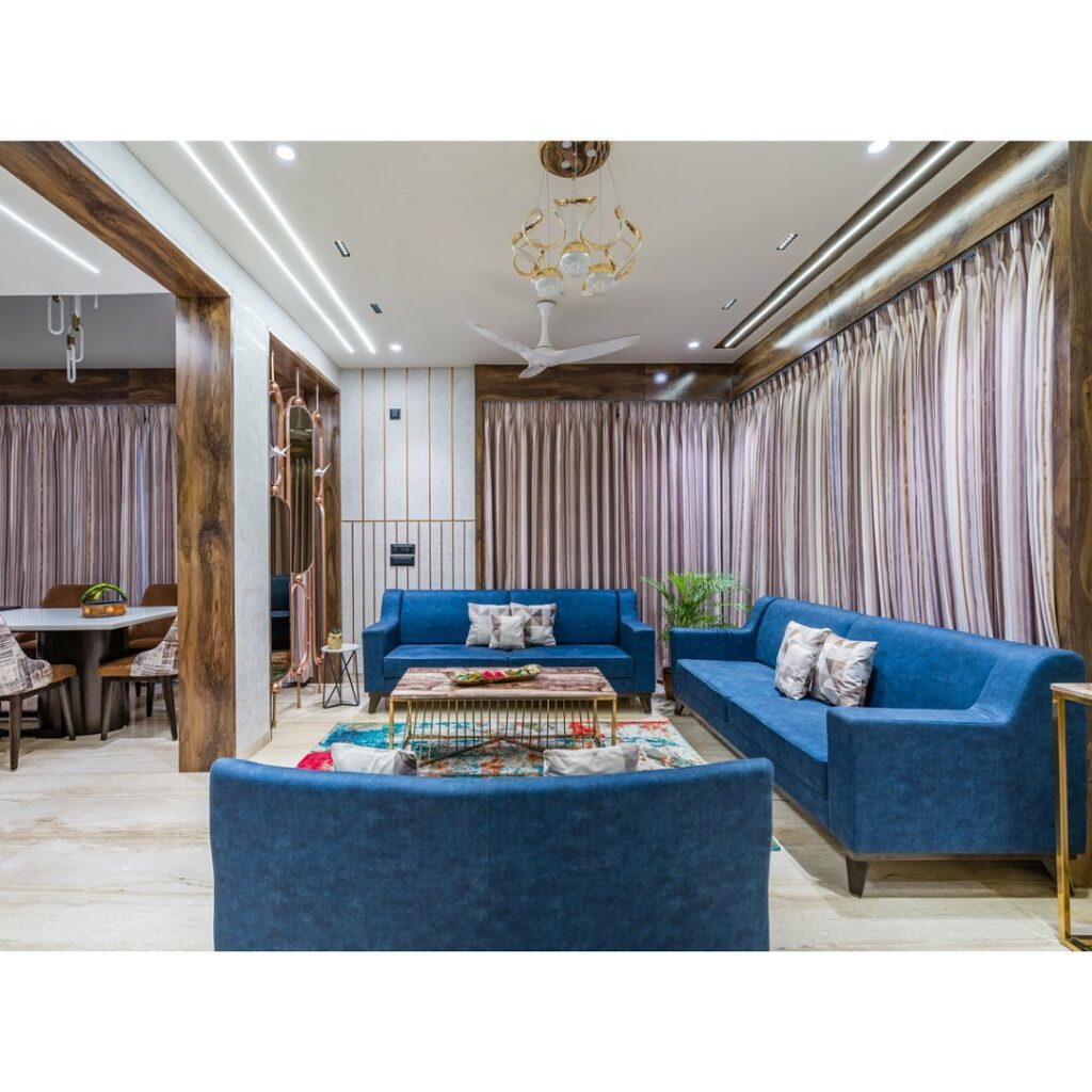 Spacious and Luxurious Living Room Featuring Light Blue Sofas