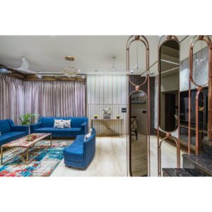 Spacious and Luxurious Living Room Featuring Light Blue Sofas